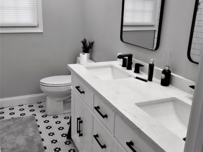 Modern Bathroom Renovation with a Double Vanity and Cabinets